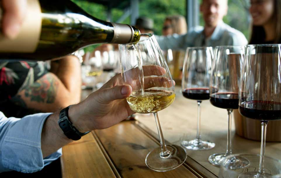 wine being poured into a glass