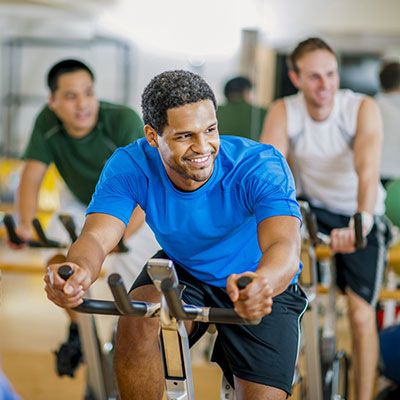 Designed to Engage Top Talent - man on stationary bike